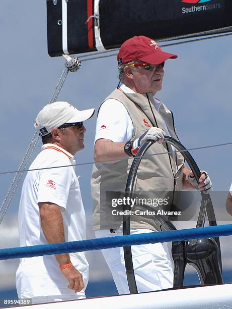 King Juan Carlos of Spain on board of "Bribon" during the 28th Copa del Rey Mapfre Audi Sailing Cup on August 4, 2009 in Mallorca, Spain.