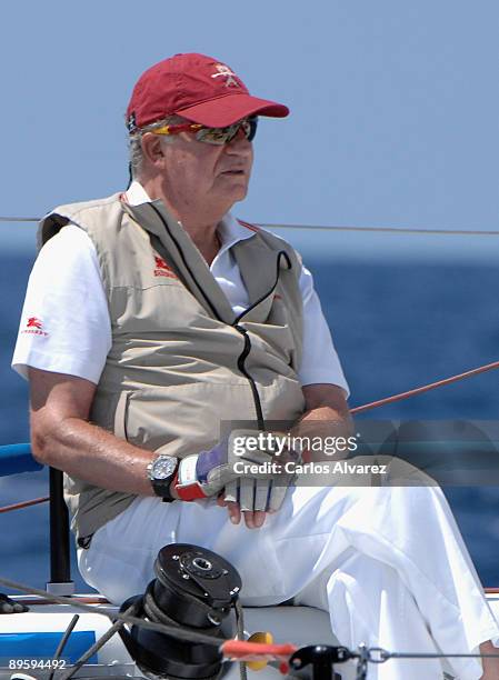 King Juan Carlos of Spain on board of "Bribon" during the 28th Copa del Rey Mapfre Audi Sailing Cup on August 4, 2009 in Mallorca, Spain.