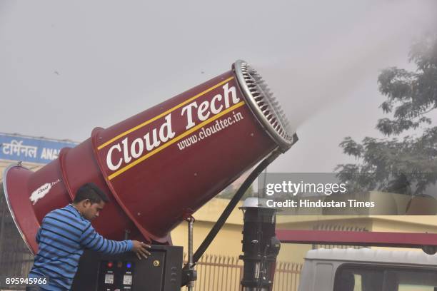 Anti-smog gun being tested by Delhi Pollution Control committee at Anand Vihar Metro station on December 20, 2017 in New Delhi, India. Anand Vihar,...