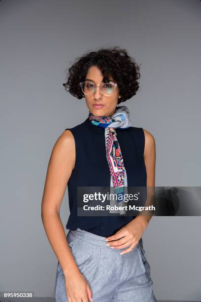 sophisticated women with coiffed frizzy hair and silk scarf that recalls a french look of the 60's - frizzy stock pictures, royalty-free photos & images