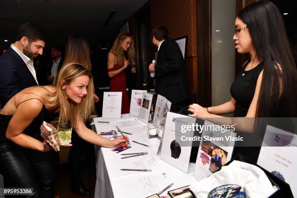 Guests attend Status Luxury Group presents The Art of Giving at Domenico Vacca on December 19, 2017 in New York City.