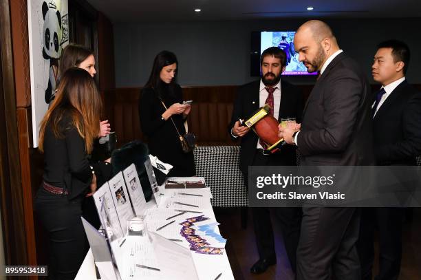 Guests attend Status Luxury Group presents The Art of Giving at Domenico Vacca on December 19, 2017 in New York City.