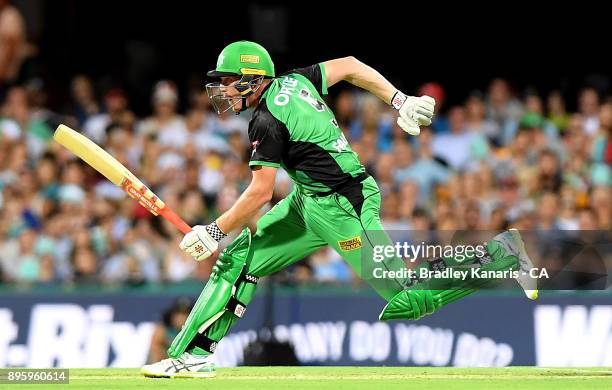 James Faulkner of the Stars runs between wickets during the Big Bash League match between the Brisbane Heat and the Melbourne Stars at The Gabba on...