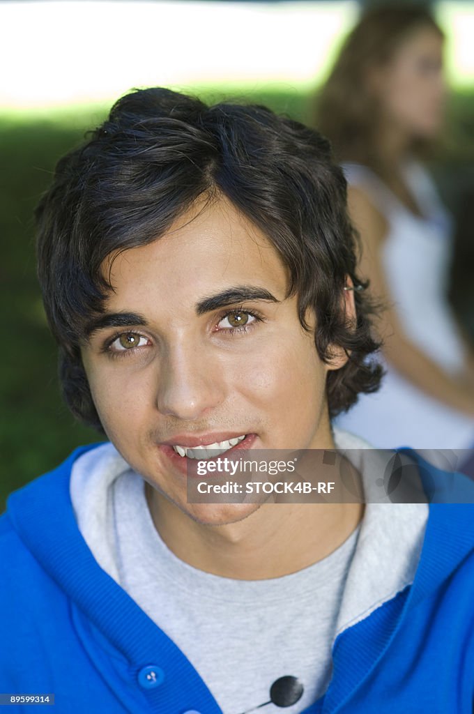 Young man smiling at camera