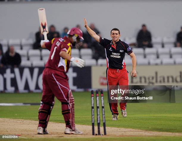 Stephen Parry of Lancashire celebrates the wicket of Andrew Hall of Northamptonshire during the NatWest Pro40 Division Two match between...