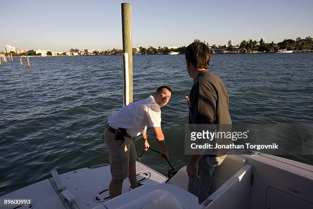 Repossession agent Louis Almaida and first mate Parris Miller working for National Liquidators the worlds largest boat and yacht liquidation company,...