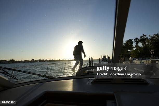 Parris Miller the boat captain's first mate working for National Liquidators the worlds largest boat and yacht liquidation company, during a...