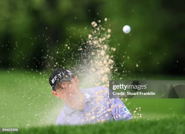 Padraig Harrington of Ireland plays his bunker shot during a practice round of the World Golf Championship Bridgestone Invitational on August 4, 2009...