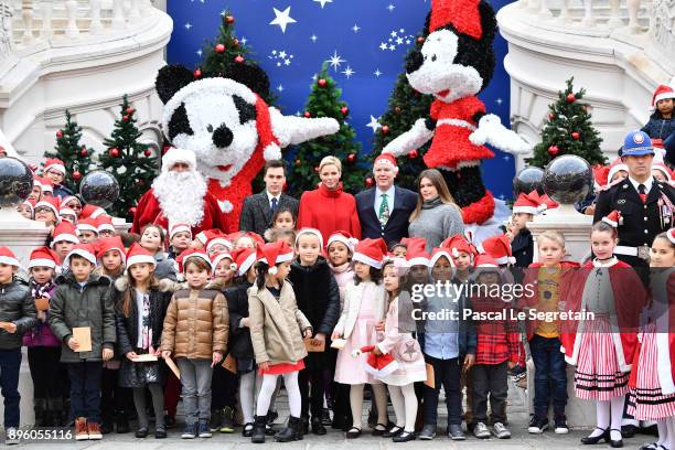 Louis Ducruet, Princess Charlene of Monaco, Prince Albert II of Monaco and Camille Gottlieb attend the Christmas Gifts Distribution on December 20,...