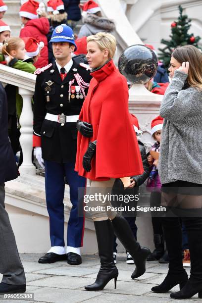 Princess Charlene of Monaco and Camille Gottlieb attend the Christmas Gifts Distribution on December 20, 2017 in Monaco, Monaco.