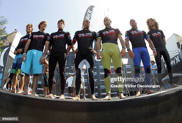 Nicol Yadin, Tom Curren, Bruce Irons, Kelly Slater, C.J. Hobgood, Heitor Alves and Rob Machado line up on the stage for the fans prior to the WPS...