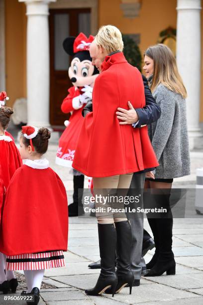 Prince Albert II of Monaco and Princess Charlene of Monaco attend the Christmas Gifts Distribution on December 20, 2017 in Monaco, Monaco.