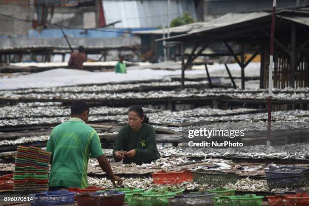 Activities at salted fish production center in Muara Angke fishing port, North Jakarta on Wednesday, December 20, 2017. The production of salted fish...