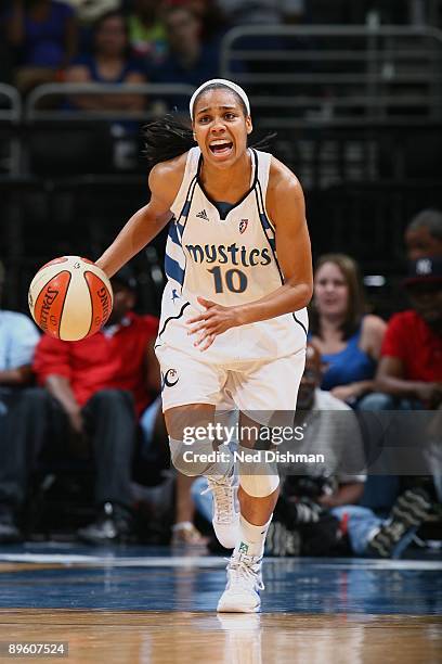Lindsey Harding of the Washington Mystics moves the ball against the San Antonio Silver Stars during the game at the Verizon Center on July 15, 2009...