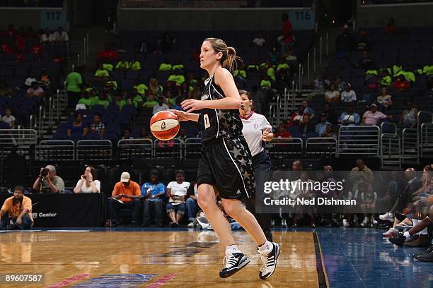 Belinda Snell of the San Antonio Silver Stars moves the ball against the Washington Mystics during the game at the Verizon Center on July 15, 2009 in...