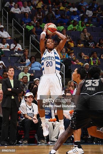 Alana Beard of the Washington Mystics takes a jump shot against the San Antonio Silver Stars during the game at the Verizon Center on July 15, 2009...