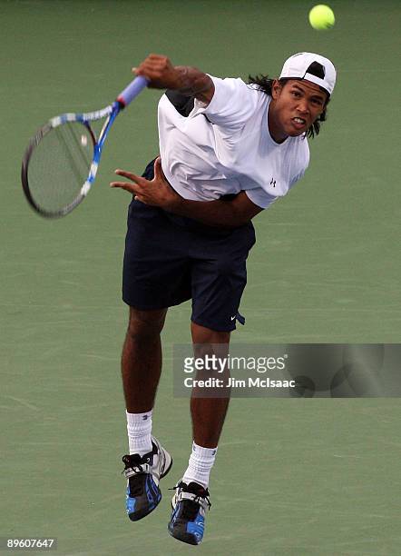Somdev Devvarman of India serves to Marin Cilic of Croatia during Day 2 of the Legg Mason Tennis Classic at the William H.G. FitzGerald Tennis Center...