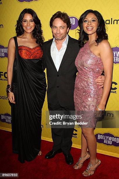 Actors Neha Dhupia, Chris Kattan and Pooja Kumar arrive at the premiere of "Bollywood Hero" at the Rubin Museum of Art August 4, 2009 in New York...