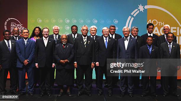 The leaders of the 15 nations attending the Pacific Islands Forum pose for a group photo at the Cairns Convention Centre on August 5, 2009 in Cairns,...