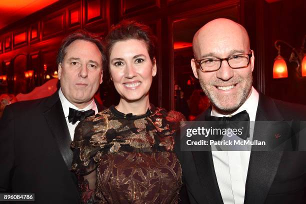 Scott Musmanno, Elizabeth Musmanno and Marc Berger attend Julie Macklowe's 40th birthday Spectacular at La Goulue on December 19, 2017 in New York...