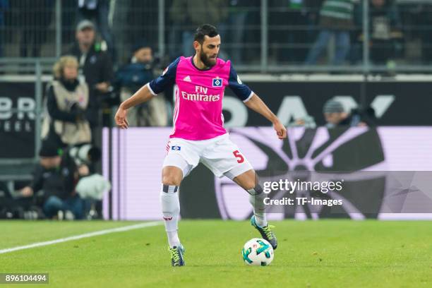 Mergim Mavraj of Hamburg controls the ball during the Bundesliga match between Borussia Moenchengladbach and Hamburger SV at Borussia-Park on...