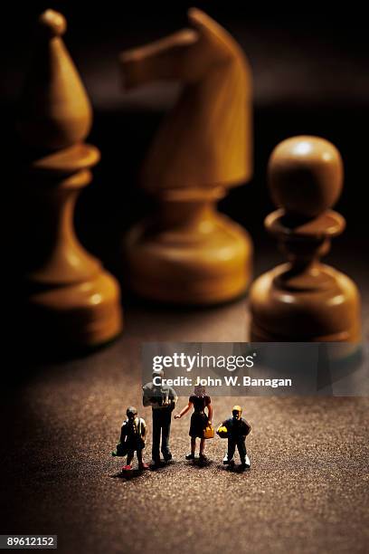 Small Female Figure Surrounded By Huge Chess Pieces Within An Ornate Old  Building Stock Photo - Download Image Now - iStock