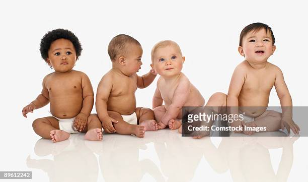 group of babies - four people stock pictures, royalty-free photos & images