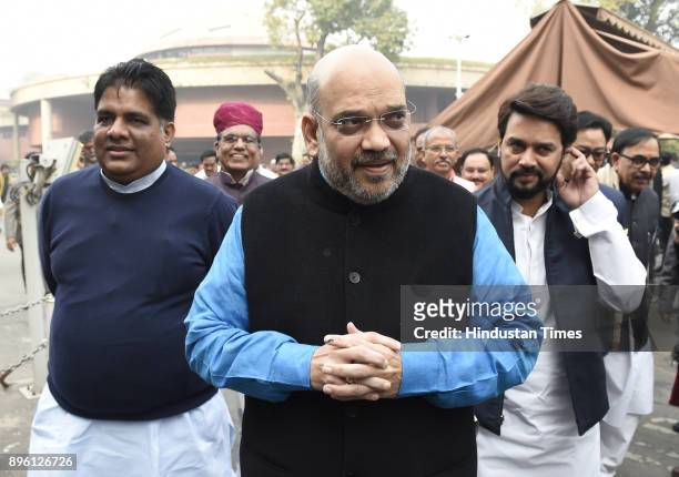 President Amit Shah with senior leader Bhupender yadav , Anurag Thakur after the BJP Parliamentary board meeting at Parliament Library on December...