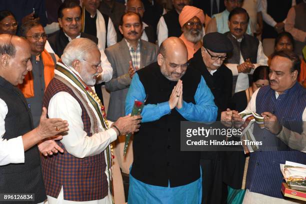 Prime Minister Narendra Modi and BJP President Amit Shah being felicitated by party leader Ananth Kumar after success in Gujarat and Himachal Pradesh...
