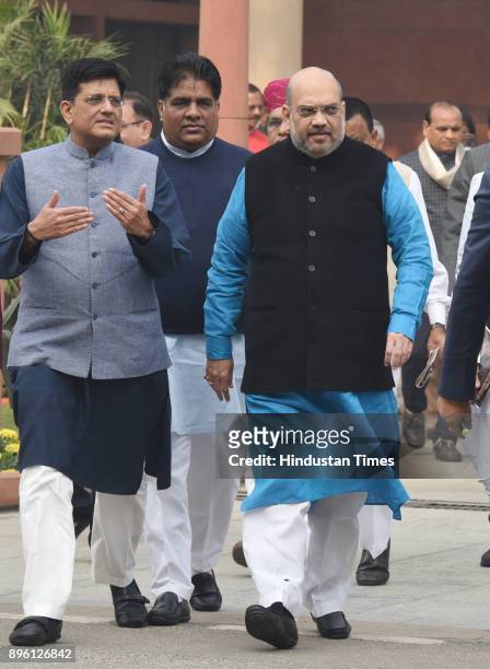 President Amit Shah with senior leader Bhupender Yadav , Railway minister Piyush Goyal, after the BJP Parliamentary board meeting at Parliament...
