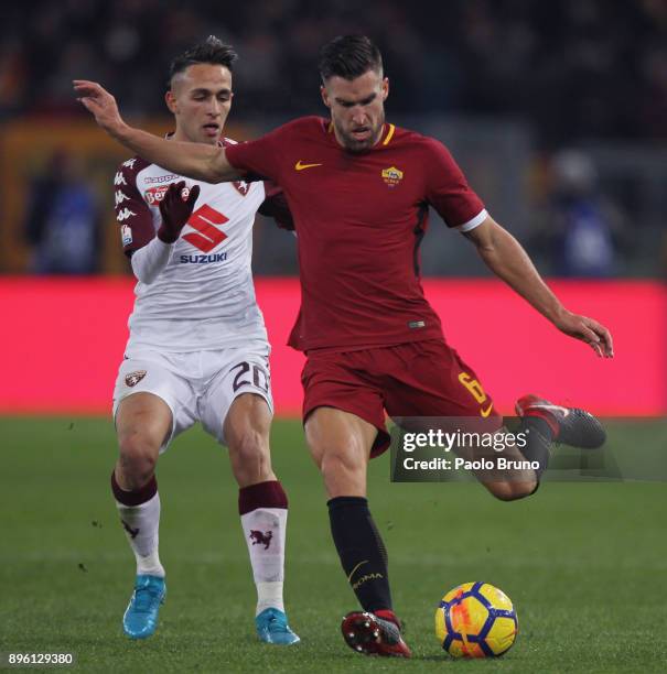 Kevin Strootman of AS Roma competes for the ball with Simone Edera of Torino FC during the TIM Cup match between AS Roma and Torino FC at Olimpico...