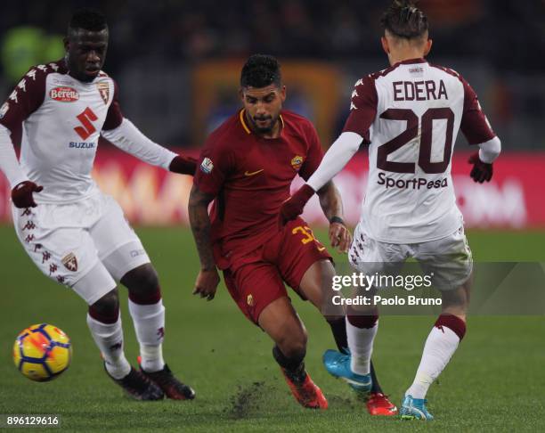 Emerson Palmieri of AS Roma competes for the ball with Simone Edera and Ebenezer Acquah of Torino FC during the TIM Cup match between AS Roma and...