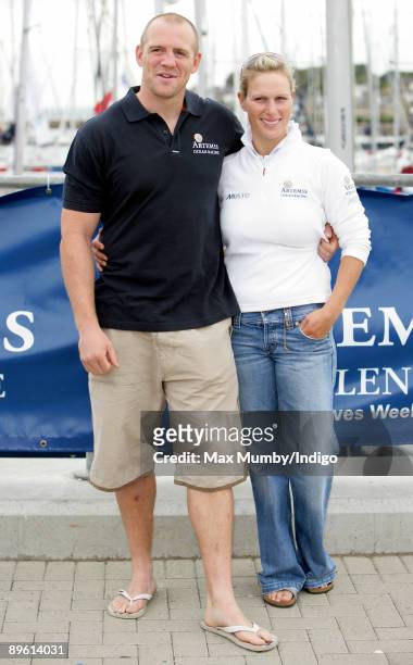 Mike Tindall and Zara Phillips pose for photographs prior to competing in the Artemis Challenge yacht race during Cowes week on August 5, 2009 in...