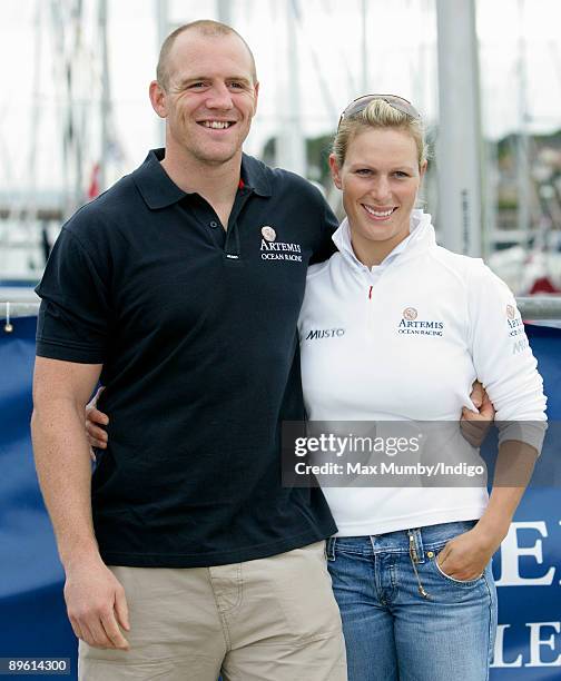 Mike Tindall and Zara Phillips pose for photographs prior to competing in the Artemis Challenge yacht race during Cowes week on August 5, 2009 in...