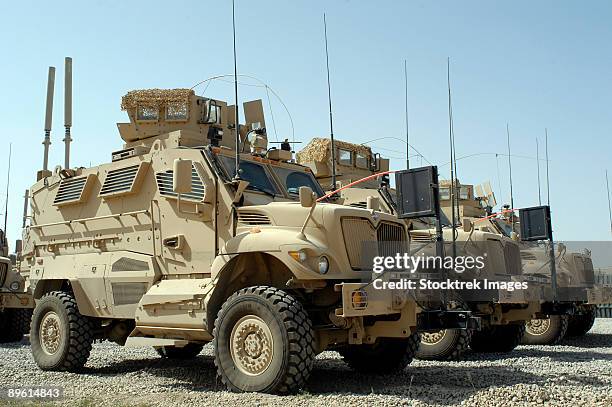 october 7, 2008 - mine resistant ambush protected vehicles sit in the 532nd expeditionary security forces group quick response force parking area at joint base balad, iraq.  - military vehicle stock pictures, royalty-free photos & images