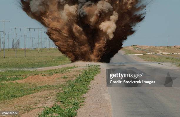 april 9, 2004 - an improvised explosive device is destroyed by c-4 explosives in the town of dibbis, iraq. - ied explosion stock pictures, royalty-free photos & images
