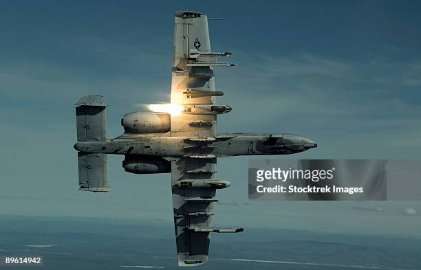 eielson air force base, alaska - an a-10 warthog breaks over the pacific alaska range complex during live fire training. - a10 warthog stock pictures, royalty-free photos & images