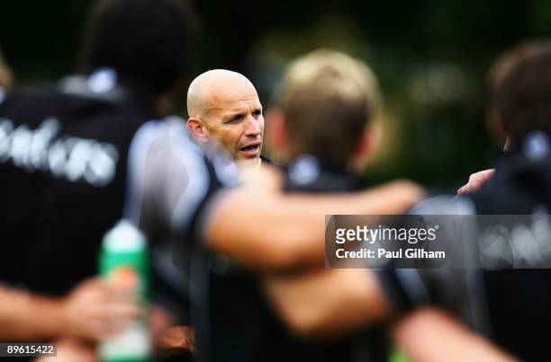 Northampton Saints Director of Rugby Jim Mallinder looks on during a training session following the Northampton Saints Photocall at Rugby School on...