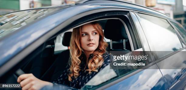that moment you know you've finally arrived - female driving stock pictures, royalty-free photos & images
