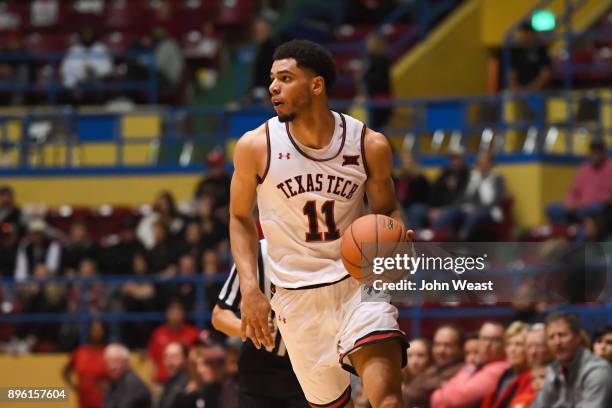 Zach Smith of the Texas Tech Red Raiders brings the ball upcourt during the game against the Rice Owls on December 16, 2017 at Lubbock Municipal...