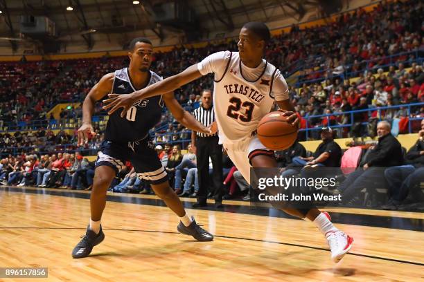 Jarrett Culver of the Texas Tech Red Raiders drives to the basket against Connor Cashaw of the Rice Owls during the game on December 16, 2017 at...