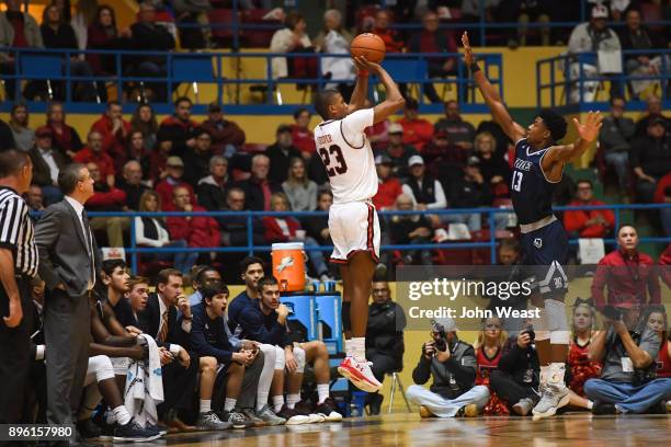 Jarrett Culver of the Texas Tech Red Raiders shoots the ball over Malik Osborne of the Rice Owls during the game on December 16, 2017 at Lubbock...