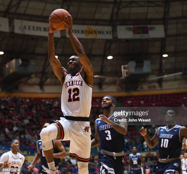 Keenan Evans of the Texas Tech Red Raiders goes up to dunk the basketball during the game against the Rice Owls on December 16, 2017 at Lubbock...