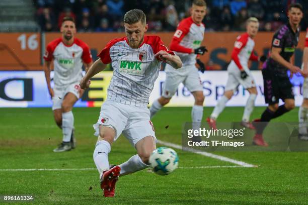 Jeffrey Gouweleeuw of Augsburg in action during the Bundesliga match between FC Augsburg and Sport-Club Freiburg at WWK-Arena on December 16, 2017 in...