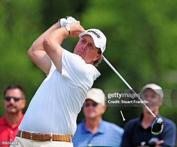 Phil Mickelson of USA plays his tee shot during a practice round of the World Golf Championship Bridgestone Invitational on August 5, 2009 at...