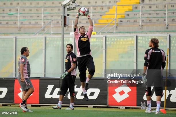 Goalkeeper coach Antonello Brambilla, Salvatore Sirigu, Fernando Rubinho and Giacomo Brichetto of U.S.Citta di Palermo in action during a training...