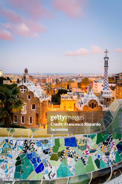 barcelona, parc guell at sunset - barcelona sagrada familia stock pictures, royalty-free photos & images