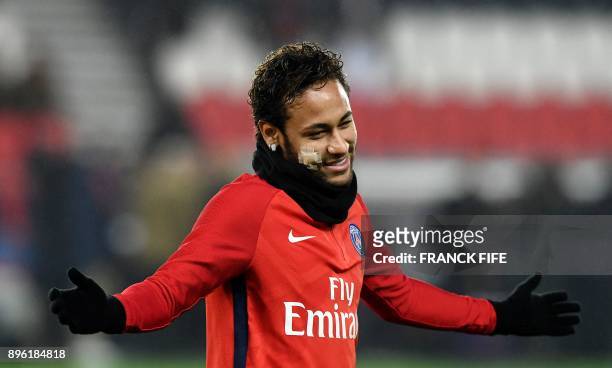 Paris Saint-Germain's Brazilian forward Neymar warms up ahead of the French L1 football match between Paris Saint-Germain and Caen at the Parc des...
