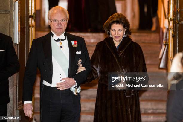 King Carl XVI Gustaf of Sweden and Queen Silvia of Sweden attend a formal gathering at the Swedish Academy on December 20, 2017 in Stockholm, Sweden.