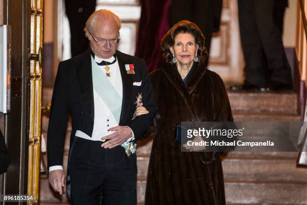 King Carl XVI Gustaf of Sweden and Queen Silvia of Sweden attend a formal gathering at the Swedish Academy on December 20, 2017 in Stockholm, Sweden.